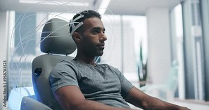 Futuristic Laboratory: Male Patient Wearing Headset for an Advanced Brain Scan Using Advanced Neural Technology. Medical Sci Fi Device Concept: Disease Treatment, Sleep, Mental Agility, IQ Growth