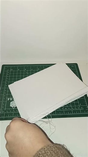 measuring thread for binding #MeasuringThread #BookbindingProcess #CraftShorts #DIYBinding #asmr