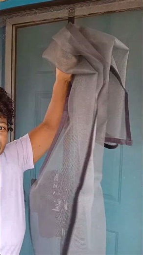 Replacing my old magnetic screen door with a new one.