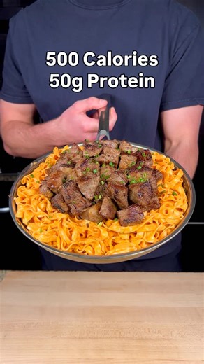 Nikita Fair on Instagram: "Chipotle Steak Alfredo 🍝 (Makes 10 Servings) Macros Per Serving: - 500 Calories - 50g Protein - 40g Carbs - 16g Fat 📕 Comment “Meal Prep” and I will DM you a purchase link to my Meal Prep Cookbook with 100+ recipes just like this! Ingredients : - 60oz Lean Steak (Top Round) (1700g) - 1 Tbsp Garlic Salt (15g) - 1 Tbsp Black Pepper (8g) - 2 Tbsps Light Butter (30g) - 20oz Protein Pasta (Dry Weight) (565g) - Fresh Chives (10g) Ingredients (Chipotle Alfredo Sauce)🌶️: -
