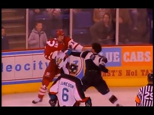 On this day In 2004 the Belfast Giants Mel Angelstad vs the London Racers Eric Cairns. | Hockey Fights UK