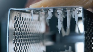 Grating Parmesan cheese - Free Stock Video Footage | Coverr