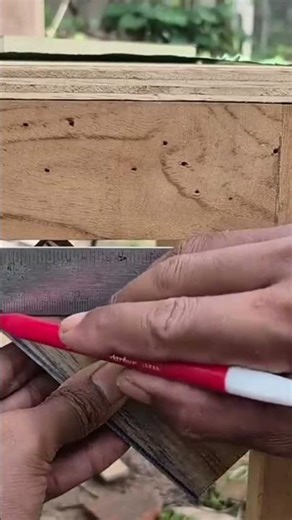 the process of measuring wood using a ruler which will then be cut to size#wood