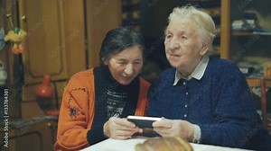 Two very old women speaking on the web chat 4K