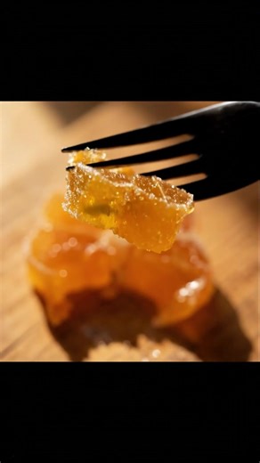 Craving a sweet and tangy treat? Learn how to make beautiful homemade candied orange slices that are perfect for garnishing, snacking, or gifting. Full Recipe Ingredients: 3 small oranges or tangelos; approximately 18 to 20 slices • 3 cups (600 grams) white granulated sugar • 3 cups (709 ml) water Steps: 1) Add the granulated sugar and water to a 12-inch skillet or a large saucepan and set it over medium-high heat. Bring the water to a boil, stirring occasionally. Ensure the sugar is completely 