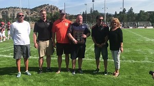Okanagan Sun Football Club President Les Weiss presented with a Canadian Junior Football League (CJFL) life membership plaque prior to kick off | British Columbia Football Conference (BCFC)
