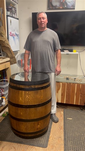 Infinity Wine Barrels are a an amazing artistic table / conversation piece for any Man Cave / She-Shed / Bar / Bistro or Wine Room #winetasting #woodworking #infinitytable #mancavedecor #sheshed | Staggering Bulldog Wood Products