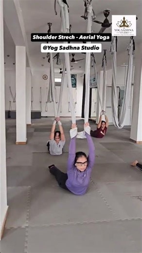 Experience a powerful Back Stretch with Aerial Yoga at Yog Sadhna Studio 🧘‍♀️✨