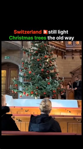 Entrepreneurialy | Money | Entrepreneur | Power on Instagram: "In Switzerland, some churches still keep a centuries-old Christmas tradition alive by lighting real candles on their holiday trees. Instead of electric lights, actual flames flicker on the branches, giving the whole space a warm, old-world glow that feels straight out of history. It’s a practice rooted in culture and ceremony, carefully maintained so the ritual stays safe while preserving a tradition that began long before modern dec