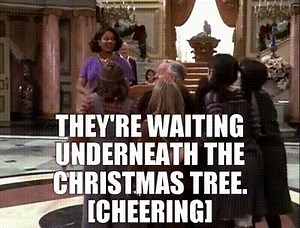 - They're waiting underneath the Christmas tree. - [Cheering]