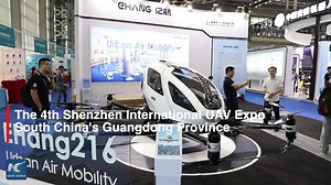 2.6K views · 71 shares | Dare you take a pilot-less drone taxi? Check out this autonomous aerial vehicle displayed at the 4th Shenzhen International UAV Expo | China Xinhua Sci-Tech | Facebook