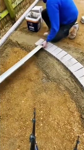 Paving process of cobblestone paths for outdoor courtyard renovation