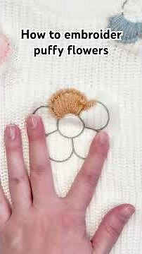 How to embroider puffy flowers using yarn on a knit! #embroidery #handbroidery