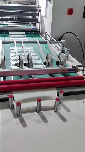 IML Die-Cutting Machine with Auto-Stacker.