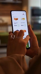 Buying groceries online. Grocery store app for mobile phone. Food delivery to your home. Fictional Interface, vertical video.