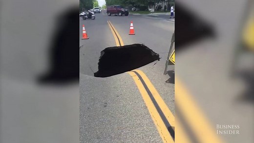 Watch this sinkhole collapse the road in Madera, California. | Business Insider
