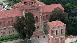 UCLA campus, University of California Los Angeles, isolated Instructional Media building aerial orbit