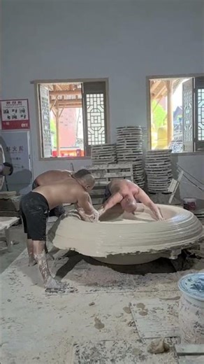 The process of making a round clay water tank