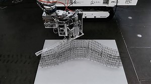 Mesh Mould: Robotically fabricated metal meshes as concrete formwork and reinforcement