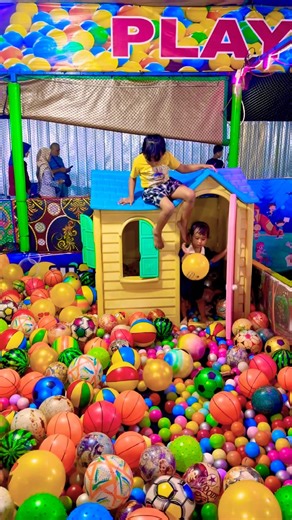 Open the door take yellow ball girl jumps from the roof onto the balls very exciting #funny #shorts