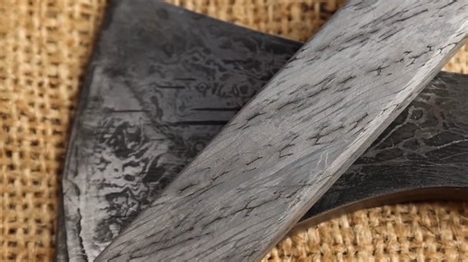 Forging a steel cable axe Damascus style