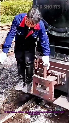 Railway Coupling: Skilled Workers Perform Manual Hook-Up Operation