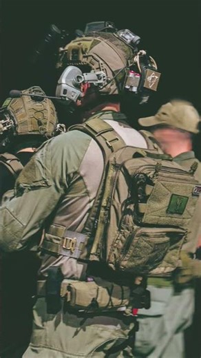 Back panel is attached to a plate carrier, which provides ballistic protection.