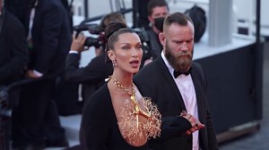 Bella Hadid covers her breasts with tree necklace