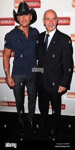 Tim McGraw helps to launch Duracell's 'Quantum Heroes Video Series' with FDNY Firehouse Engine 33 in Manhattan  Featuring: Tim McGraw,Salvatore J. Cassano Where: NYC, NY, United States When: 15 Aug 2013 Stock Photo - Alamy