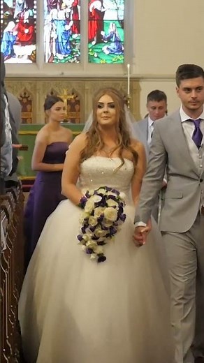 Bride and groom walking down the aisle