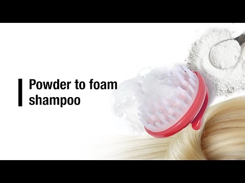Powder to foam shampoo