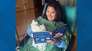 How reading to newborn babies can help their development