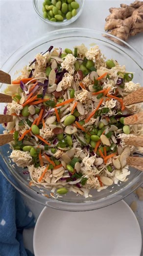 This crunchy ramen noodle salad is a healthy twist on the classic potluck favorite, lightened up and loaded with plant-based protein. It’s perfect for parties, meal prep, or a quick weeknight dinner! For the Salad: 6 oz uncooked ramen noodles (seasoning packet discarded) 1/2 cup sliced almonds 14 oz shredded cabbage (about 6 cups) 2 cups frozen shelled edamame, thawed 4 green onions, chopped 1 tablespoon sesame seeds (optional) For the Dressing: 3 tablespoons rice vinegar 3 tablespoons low-sodiu