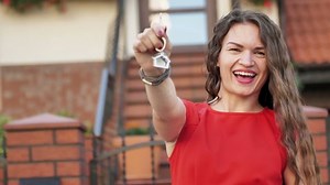 Young Woman Showing Key Her New Stock Footage Video (100% Royalty-free) 1035076382 | Shutterstock