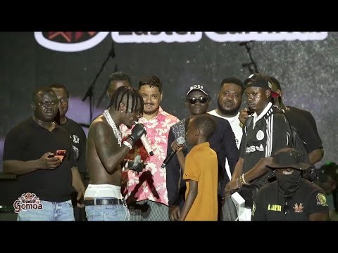 Shatta Wale Gifts A Young Fan Who Surprised Him $300 At Gomoa Festival