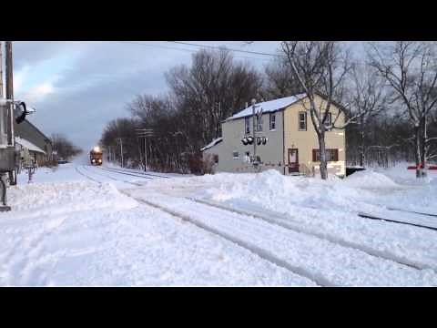2 trains hit a HUGE snow pile!!!