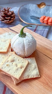 How to Make a Mini Goat Cheese Pumpkin Such a fun (and easy!) way to dress up your fall board. All you need is: * 1 log of goat cheese * Plastic wrap * Kitchen twine * A pepper stem Here’s how: 1. Wrap the goat cheese log in plastic wrap and gently shape it into a ball. 2. Tie kitchen twine around it, crisscrossing to create pumpkin “ridges.” Chill for about 15 minutes. 3. Remove the twine and plastic wrap to reveal the pumpkin shape. 4. Finish by pressing a pepper stem into the top. 👉 Dependin