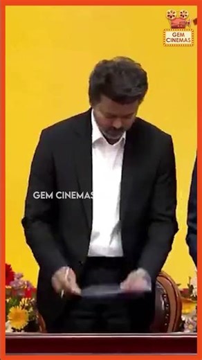 C Joseph Vijay signs the first set of documents after taking oath as the Chief Minister.