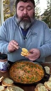 Talk about a touchdown! This Crawfish Rotel Cheese Dip is the perfect appetizer for the Big Game! Crawfish Rotel Cheese Dip Recipe Ingredients: - 1lb crawfish tails - 1lb Velvetta Cheese - cubed - 1 can Diced RO*TEL Tomatoes - 1lb Andouille Sausage - ½ cup diced Onion - ½ cup diced Red Bell Pepper - 2-3 cloves minced Garlic - 1 Tablespoon King Craw Cajun Seasoning - 3-4 Green Onions - chopped - French Baguette for dipping Directions: 1. Preheat pellet grill to 350 degrees. Dice the smoked sausag