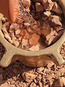 Breaking Clay and Pouring Water Pottery Experience