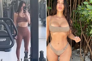 Kim Kardashian shows off incredible abs in sports bra & tight leggings