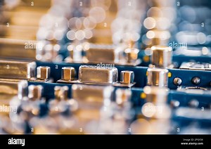 Close-up blurry metal sockets on a computer video board. Concept for the production of computer televisions and audio speakers Stock Photo - Alamy