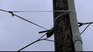 Broken utility pole looks dangerous, but Oncor ensures residents of its safety