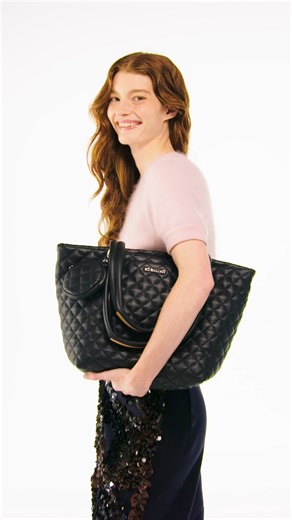Day 2: THE SMALL LEATHER METRO TOTE Our fan-favorite Small Metro Tote in limited-edition black leather – now with longer handles and a detachable clip-on pouch for essentials you want close. Follow the link to shop https://mzwallacenyc.visitlink.me/YctGF6 | MZ Wallace