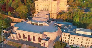 Saint Joseph's Oratory soars above Montreal, Canada, at sunset. The basilica is a major pilgrimage site, attracting visitors for its architecture and spiritual significance.