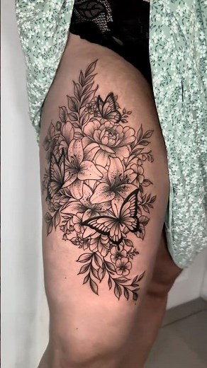 🦋 Floral Butterfly Thigh Tattoo | Elegant Black & Grey Floral Design