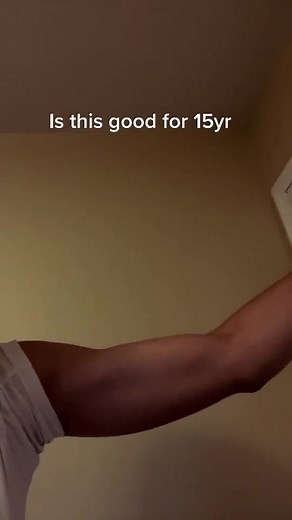 Muscle Kid Flexing Without a Workout Routine