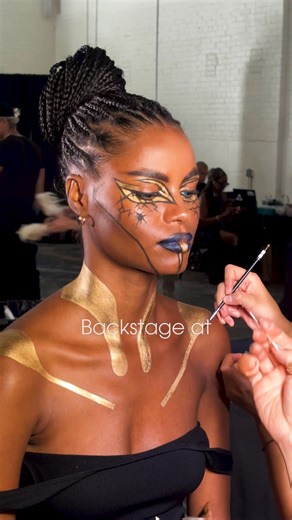 We went backstage at #nyfw to watch this model transform into Levaine from Borderlands 4 and walk the runway at the Who Decides War Spring 2026 show. The designers put together this look based on Levaine's dress from the game, and it slotted into a stunning line-up of outfits in flowing, distressed fabrics. #gaming #borderlands4 #fashion | Polygon | Facebook