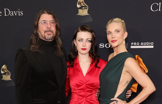 Dave Grohl makes first red carpet appearance with his family since having a baby with another woman