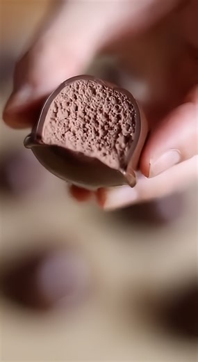 3-Ingredient Homemade Musketeers Truffles 3-Ingredient Cool Whip Chocolate Bites Ingredients: 12 oz (340g) milk chocolate chips, melted 8 oz (225g) whipped topping (Cool Whip), thawed 12 oz (340g) dark chocolate chips or melting wafers, melted Directions: 1. Pour the melted milk chocolate into a bowl with the whipped topping. 2. Fold the mixture gently until it thickens into a firm, fudge-like dough. 3. Chill the dough briefly, then roll into small, bite-sized balls and place on a tray. 4. Chill